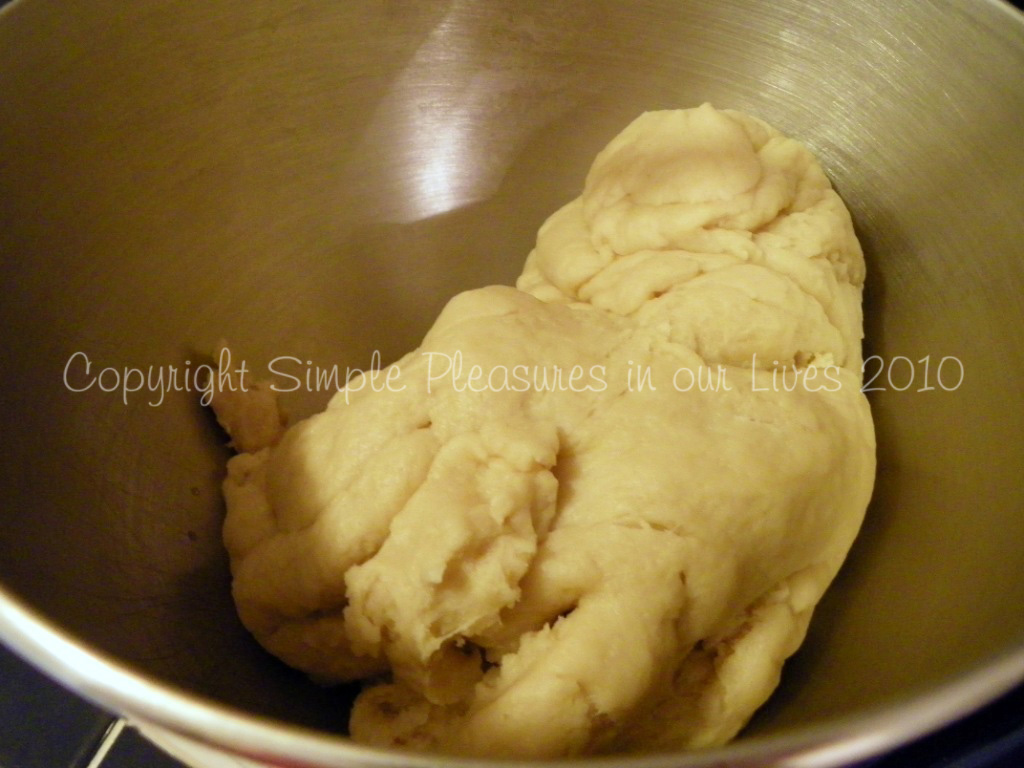 Change to dough hook and gradually add water as you knead on low for 10 minutes
