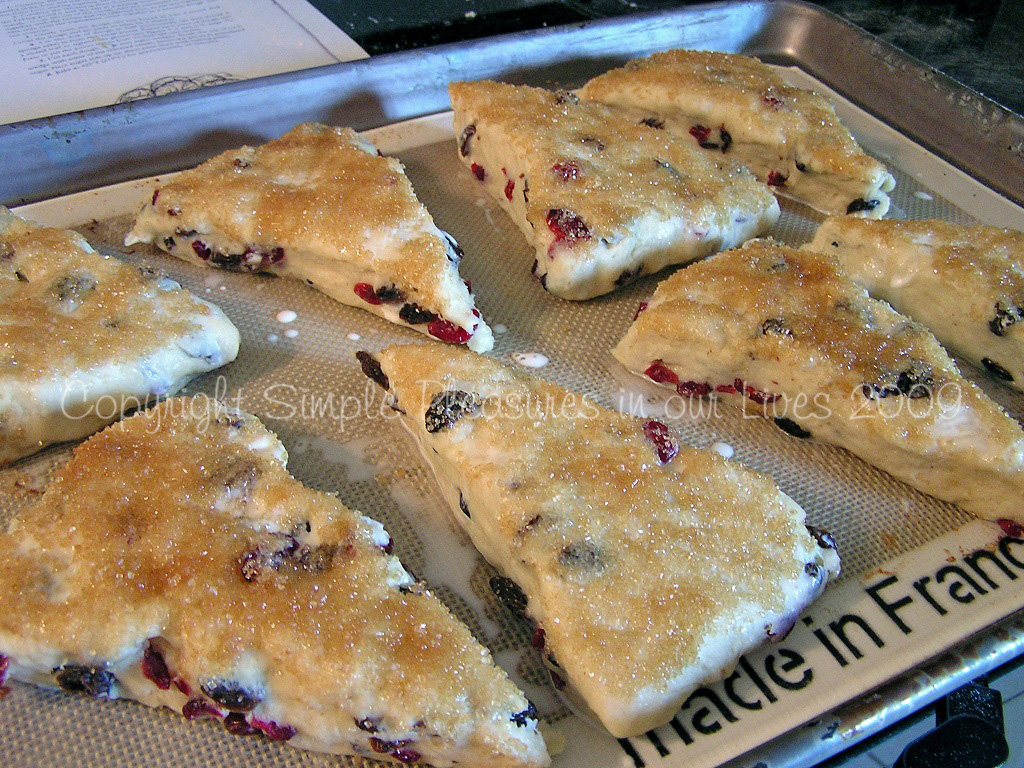 Brush top with cream and invert pieces in turbinado sugar (or granulated sugar)
