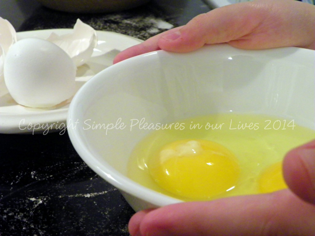 Usually, I crack the eggs for Alex but he did it by himself this time with hardly any help...great job, bud!