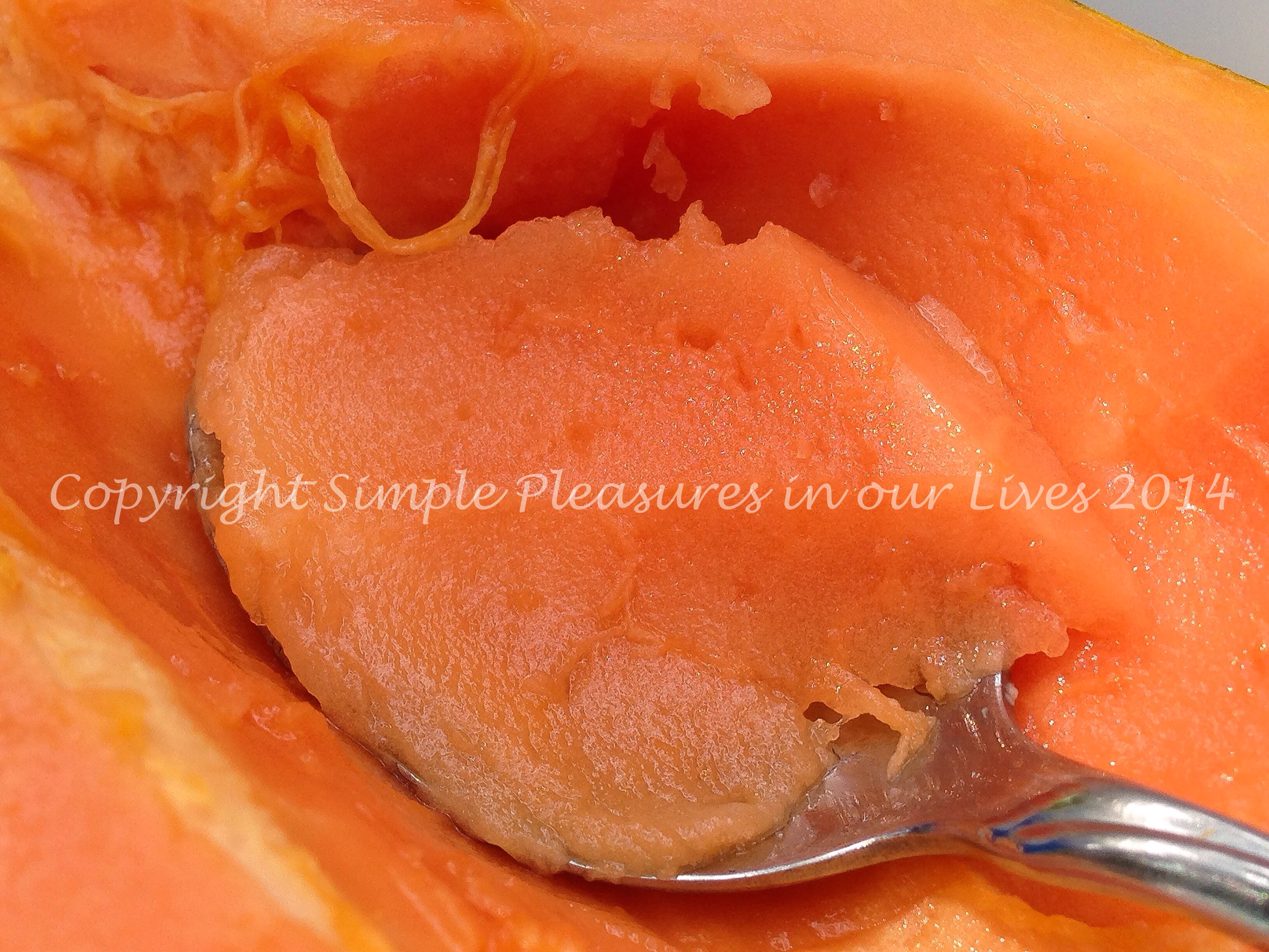 Just scrape the seeds off and eat it with a spoon. Yum!